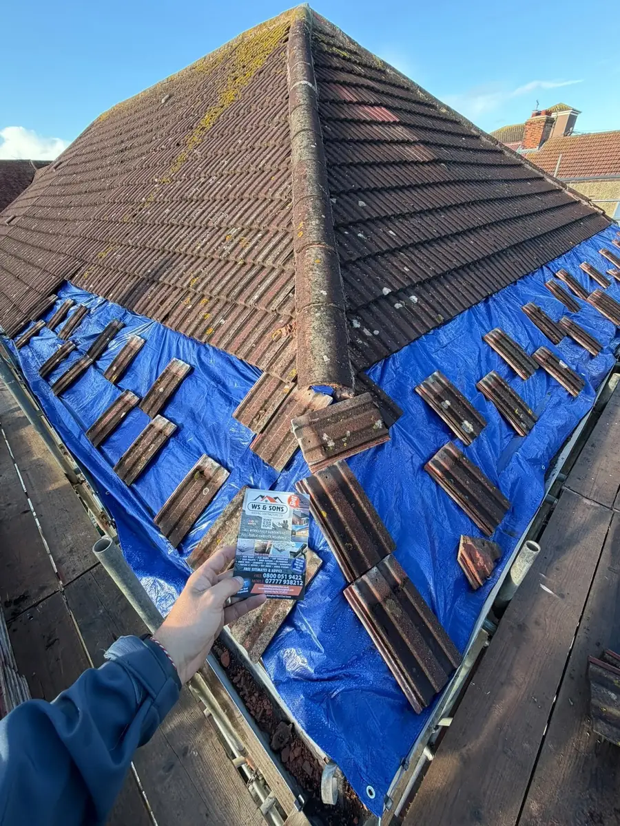 Blue membrane and new tiles on a hip, flyer in shot