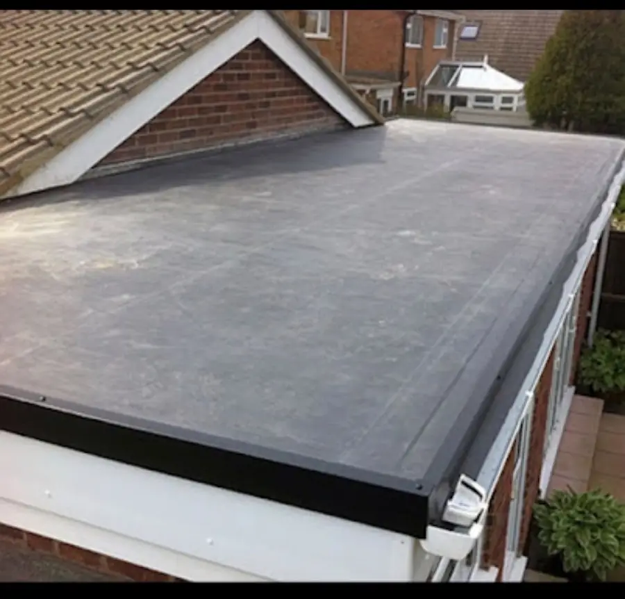Felt flat roof with new trims on the side of a bungalow