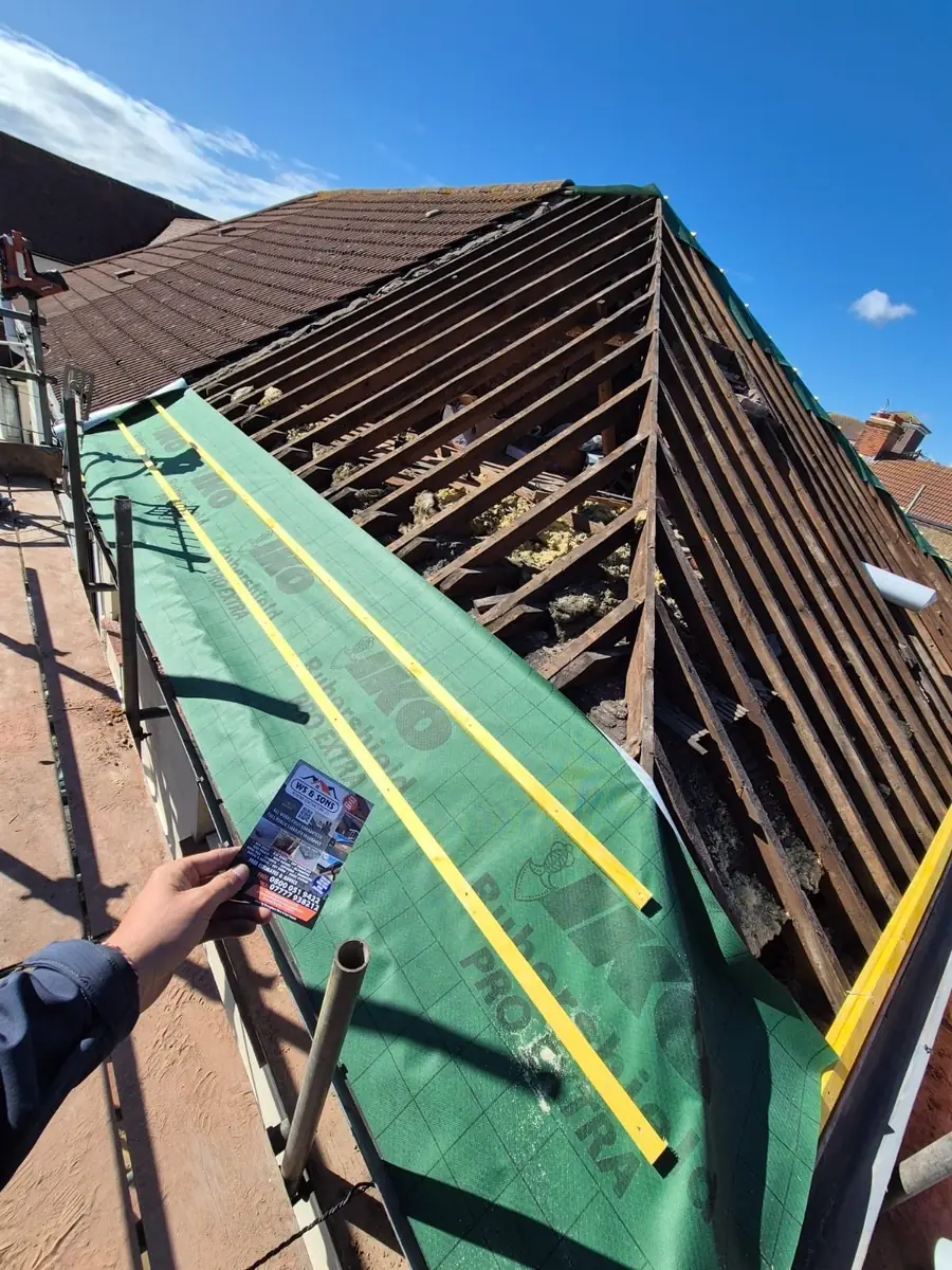 Membrane and battens on a hip roof from the scaffold