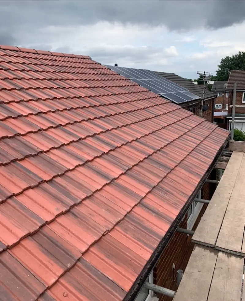 Red interlocking tile roof finished from the scaffold