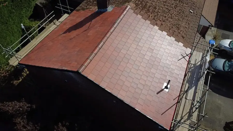 Wide view of a finished red tile roof