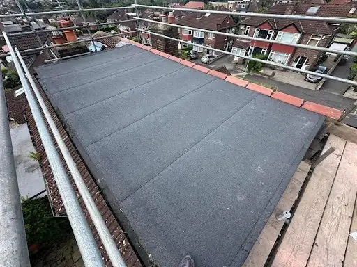 New torch-on felt flat roof seen from the scaffold